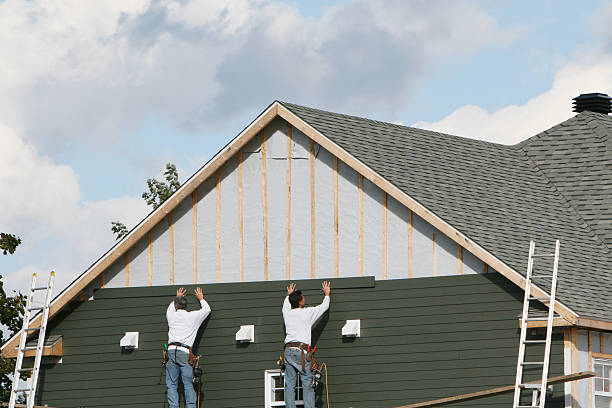 Professional Siding technician working in Quinton, VA